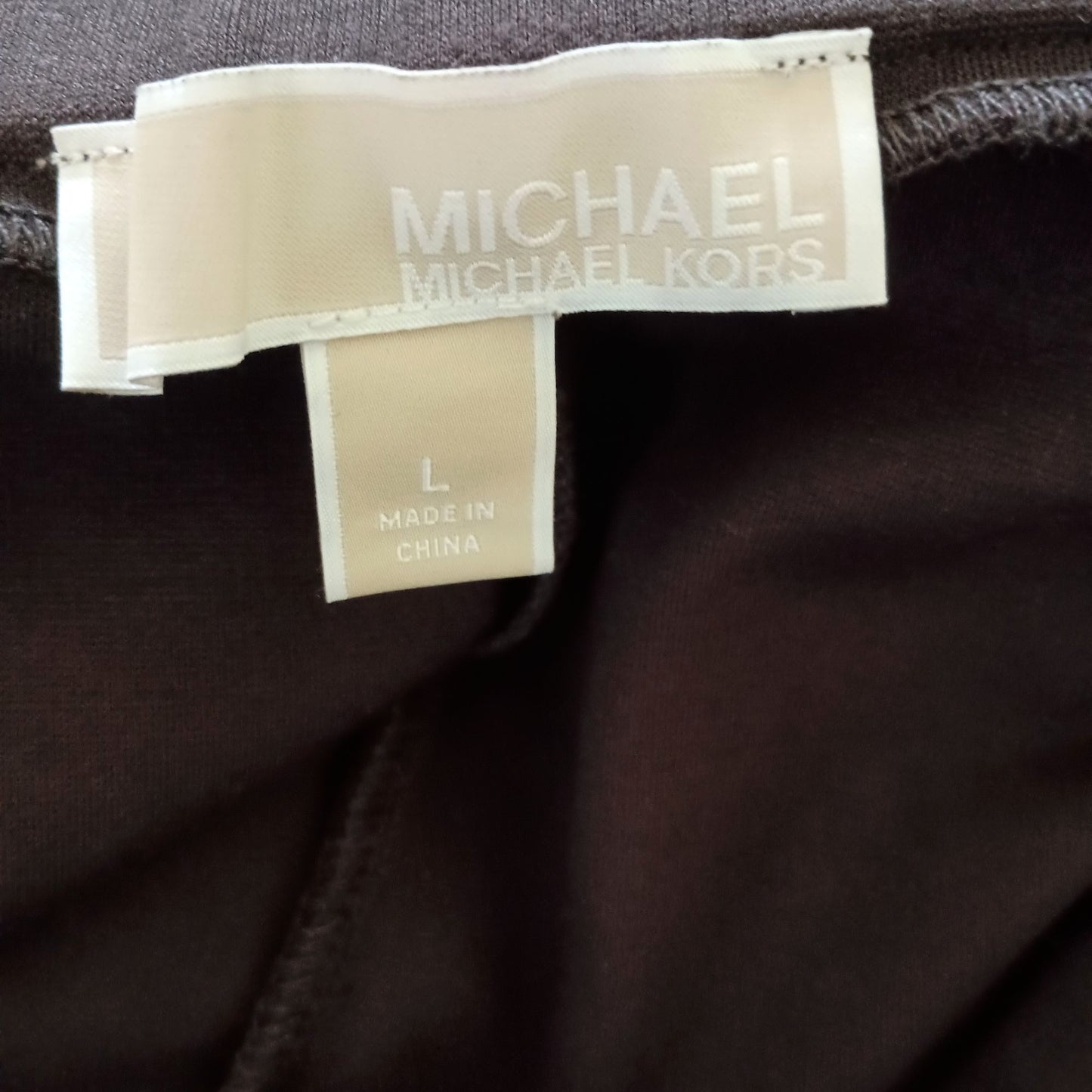 Michael Kors brown mixed media side zip leggings size L